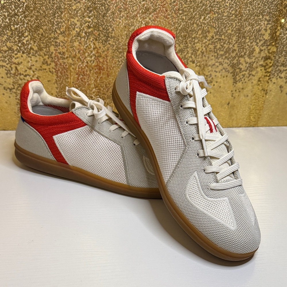 Rothy's The RS01 Men's Sneakers in an off White and Red colorway with gum sole